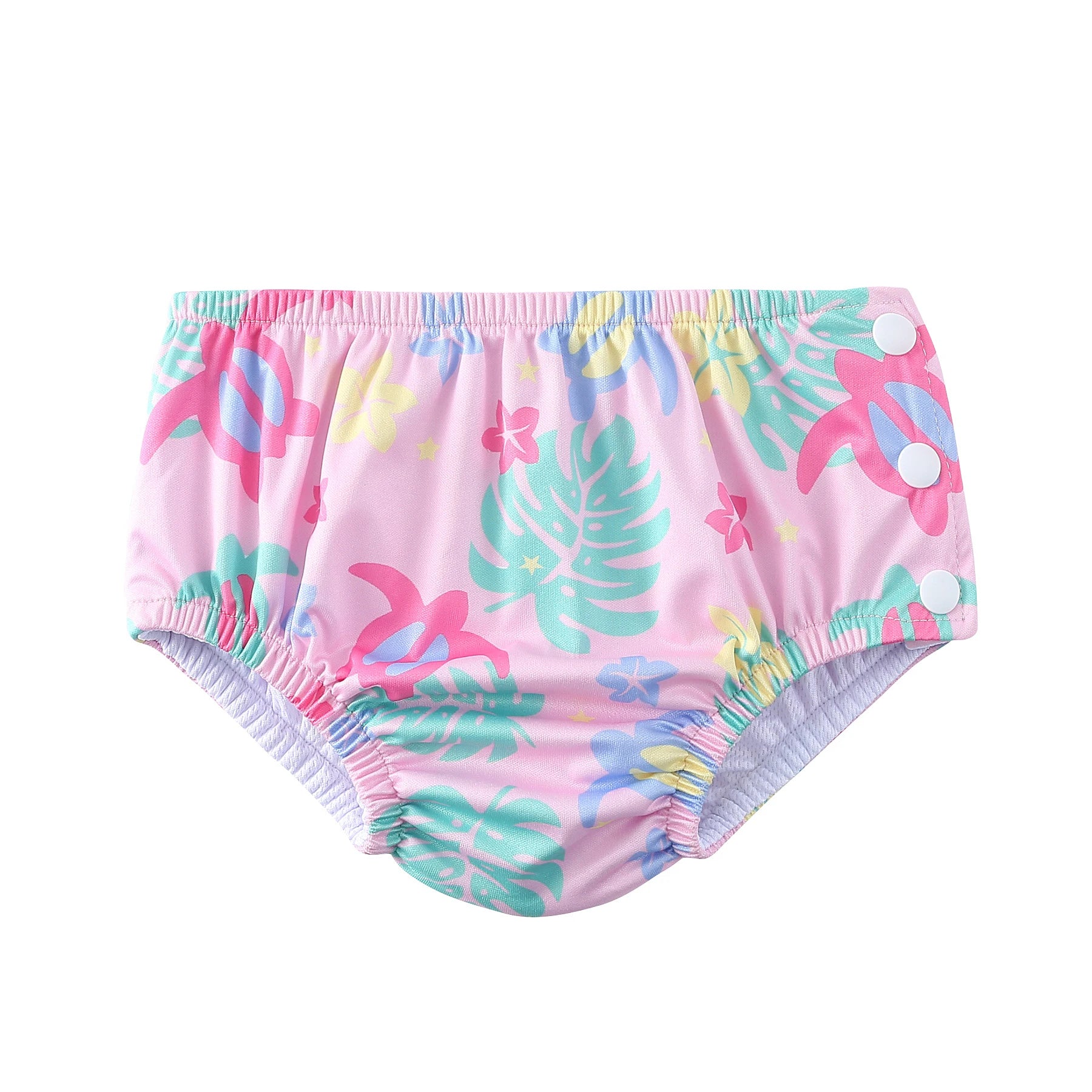 Pink reusable baby swim diaper with tropical turtle and floral print, featuring adjustable side snap buttons.