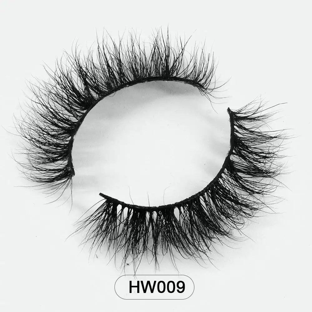 Black 3D mink false eyelashes with a soft flex band and fluffy, wispy texture, labeled model HW009.