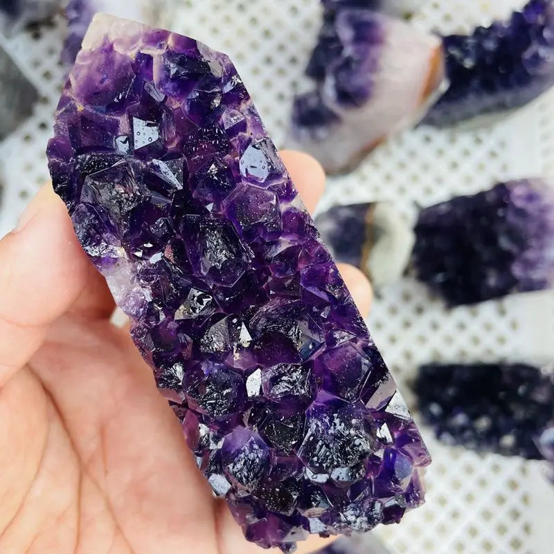 Purple amethyst druzy crystal cluster point with glittering surface