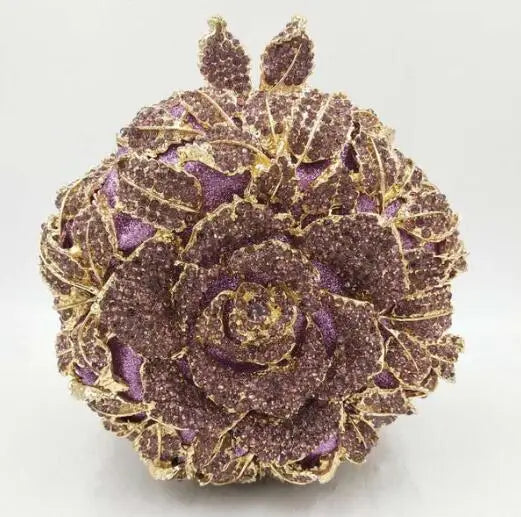 Purple crystal floral designer clutch bag, rose-shaped evening handbag for weddings, gold trim, rhinestone detail.