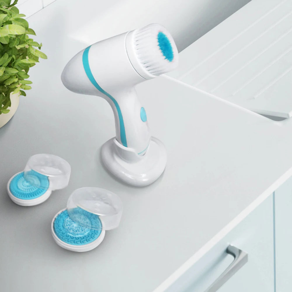 White and blue sonic facial cleansing brush set with multiple exfoliating heads for deep skin cleaning and care.