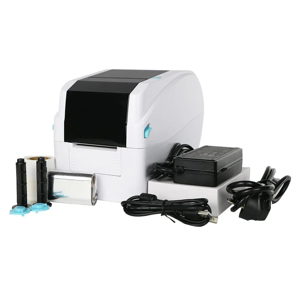 White desktop direct thermal printer with power adapter and supply rolls