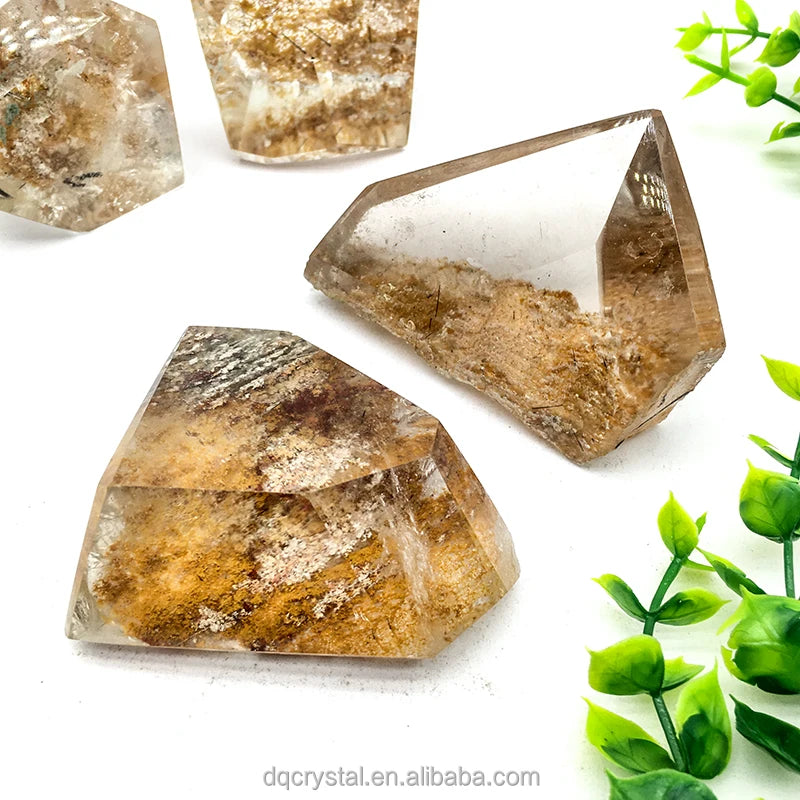 Large free-form polished phantom quartz crystal with clear and golden-brown layers