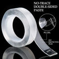 White double-sided nano tape roll with protective film layers, clear edge sections visible