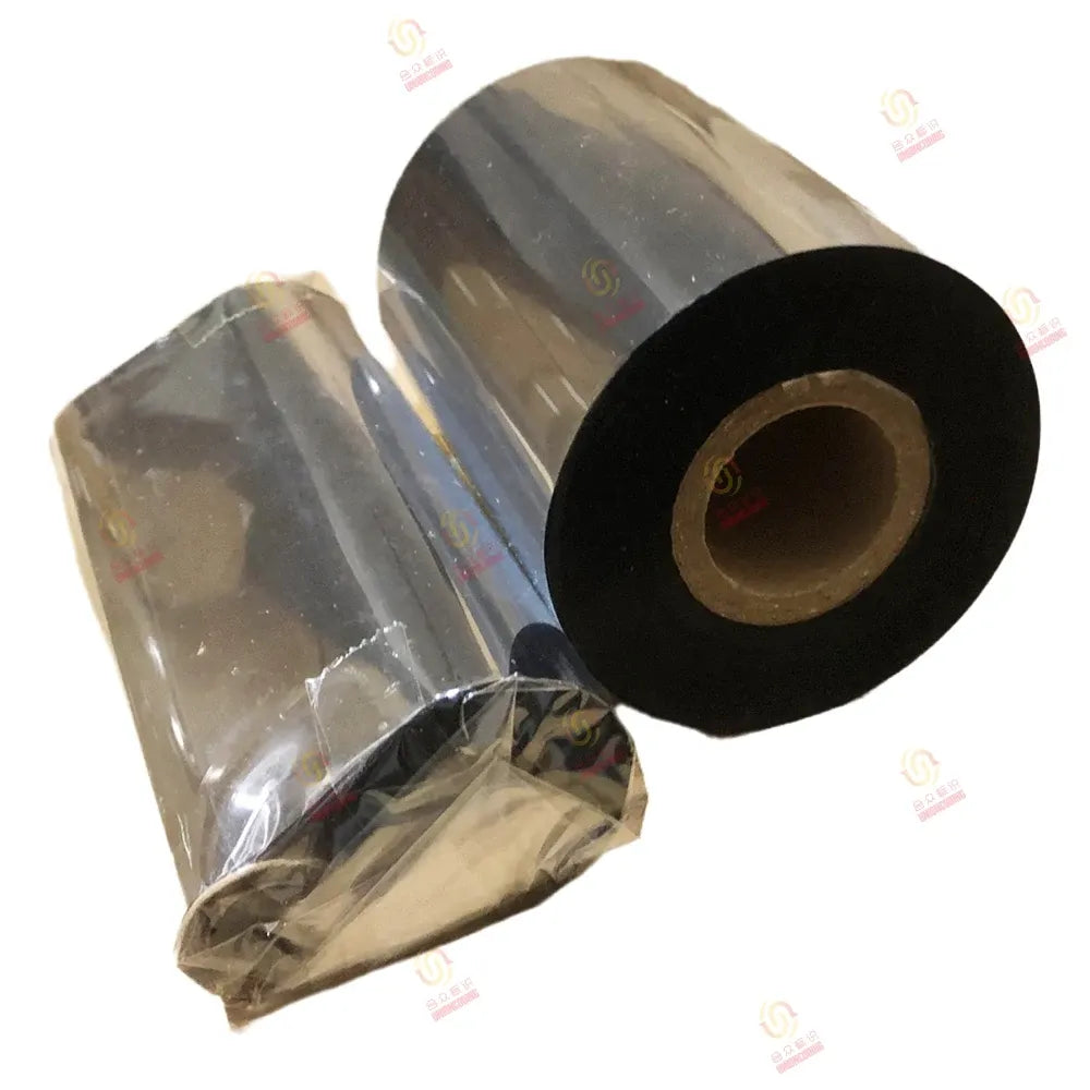 Black resin printer ribbon roll beside another roll in clear packaging