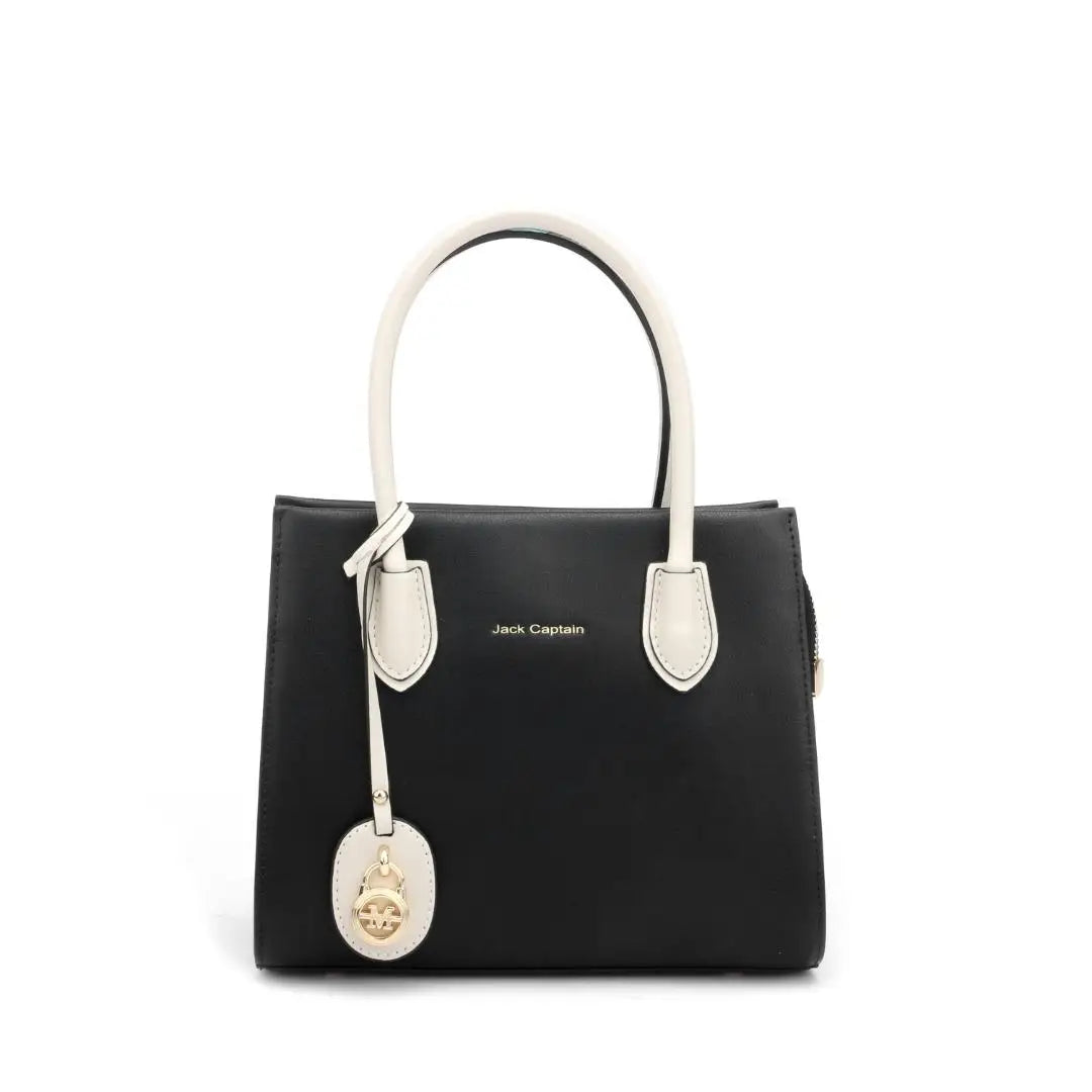 Jack Captain black genuine leather designer tote bag with white handles and gold pendant charm. Casual shoulder bag.