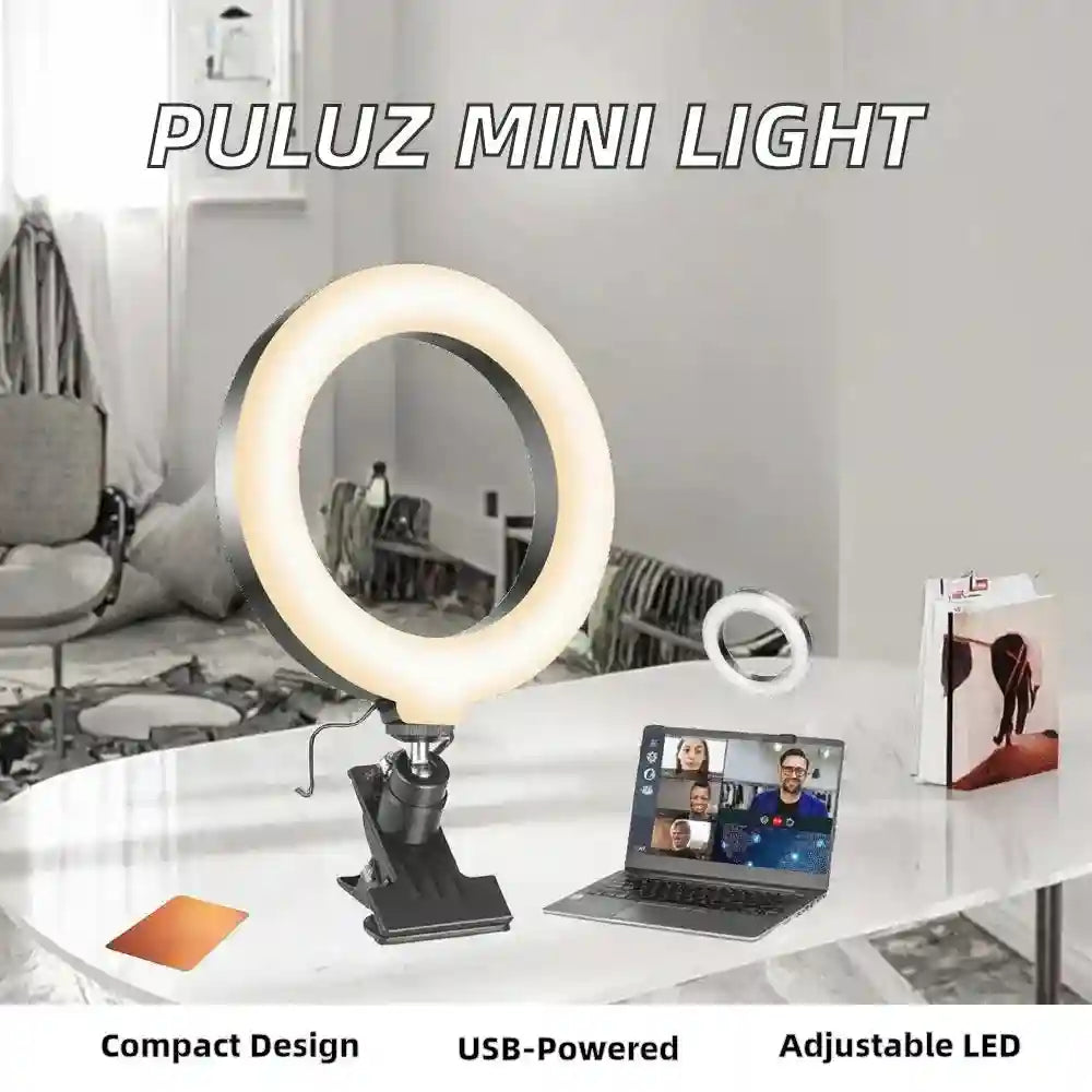 Black clip-on circular LED ring light with adjustable mount, used for video conferencing and desk lighting.