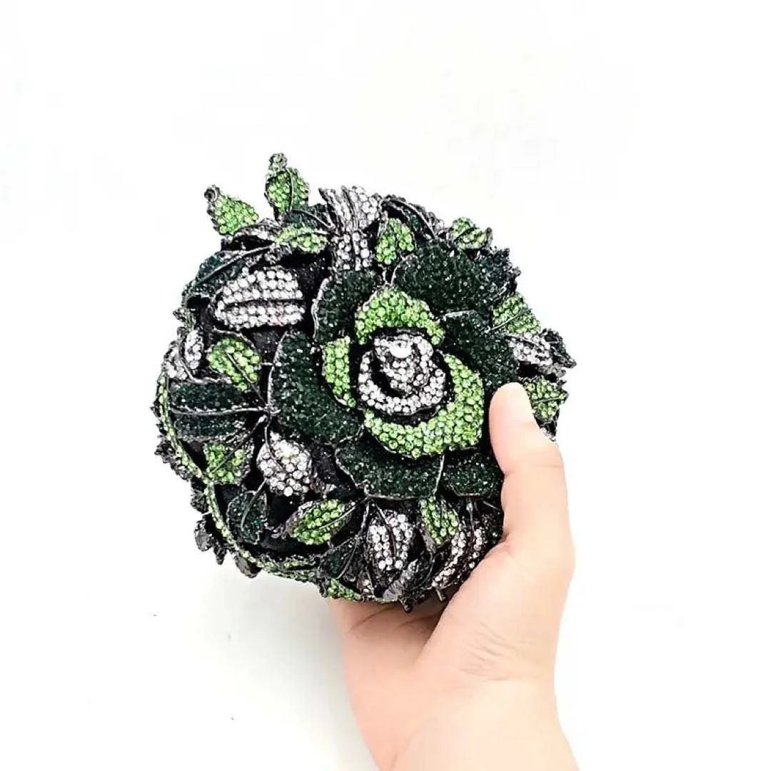 Green and black crystal flower evening clutch bag. Luxury designer handbag for weddings and formal parties.