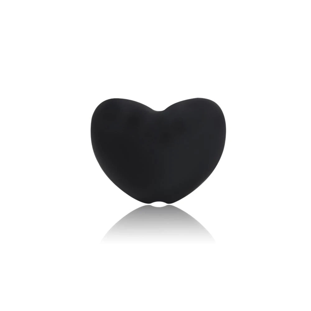 Black heart-shaped silicone baby teething toy for soothing sore gums.