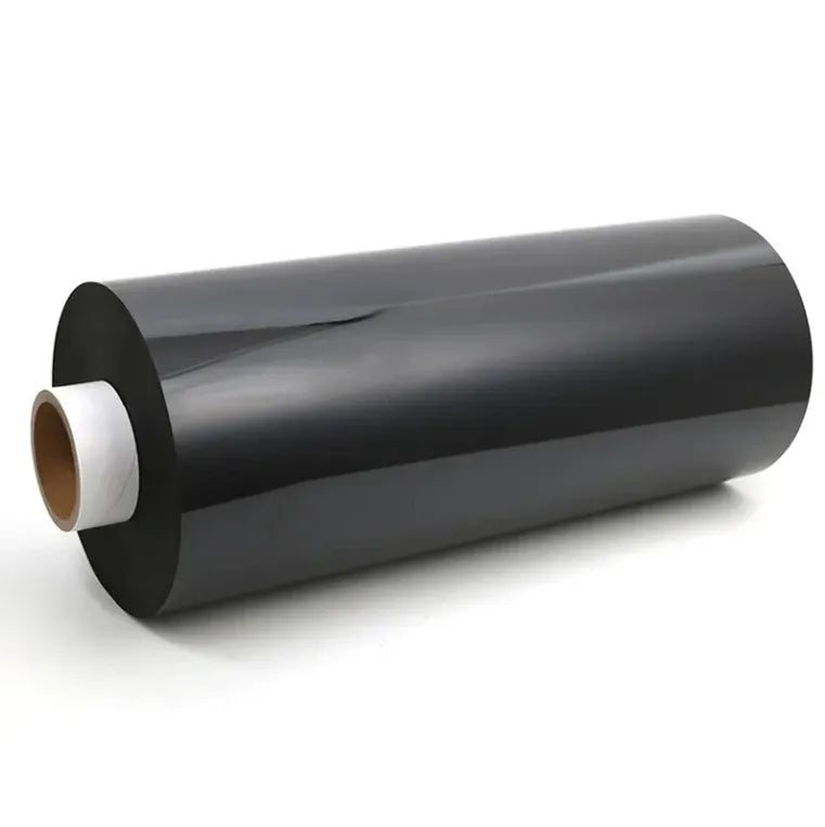 Rolled black double-sided urethane foam tape on a cardboard core