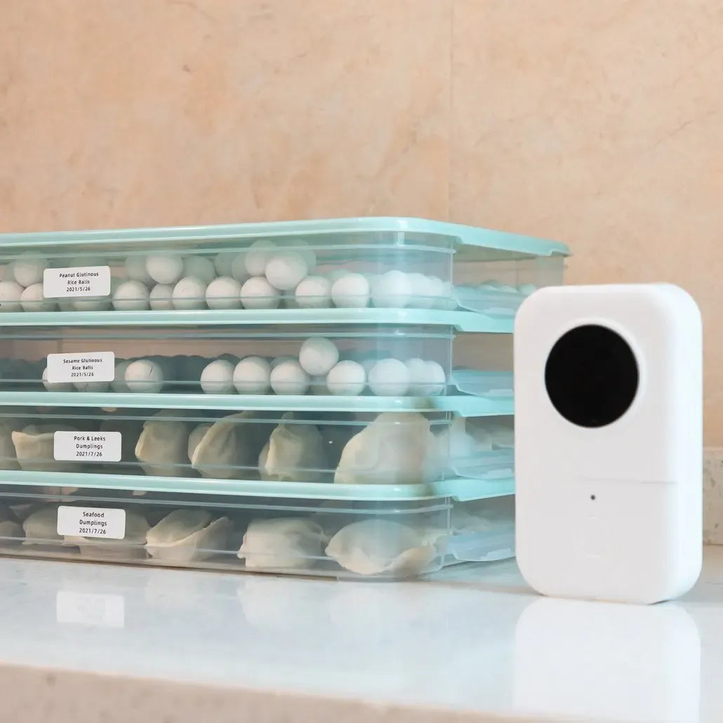 White label printer using thermal label tape on freezer storage containers