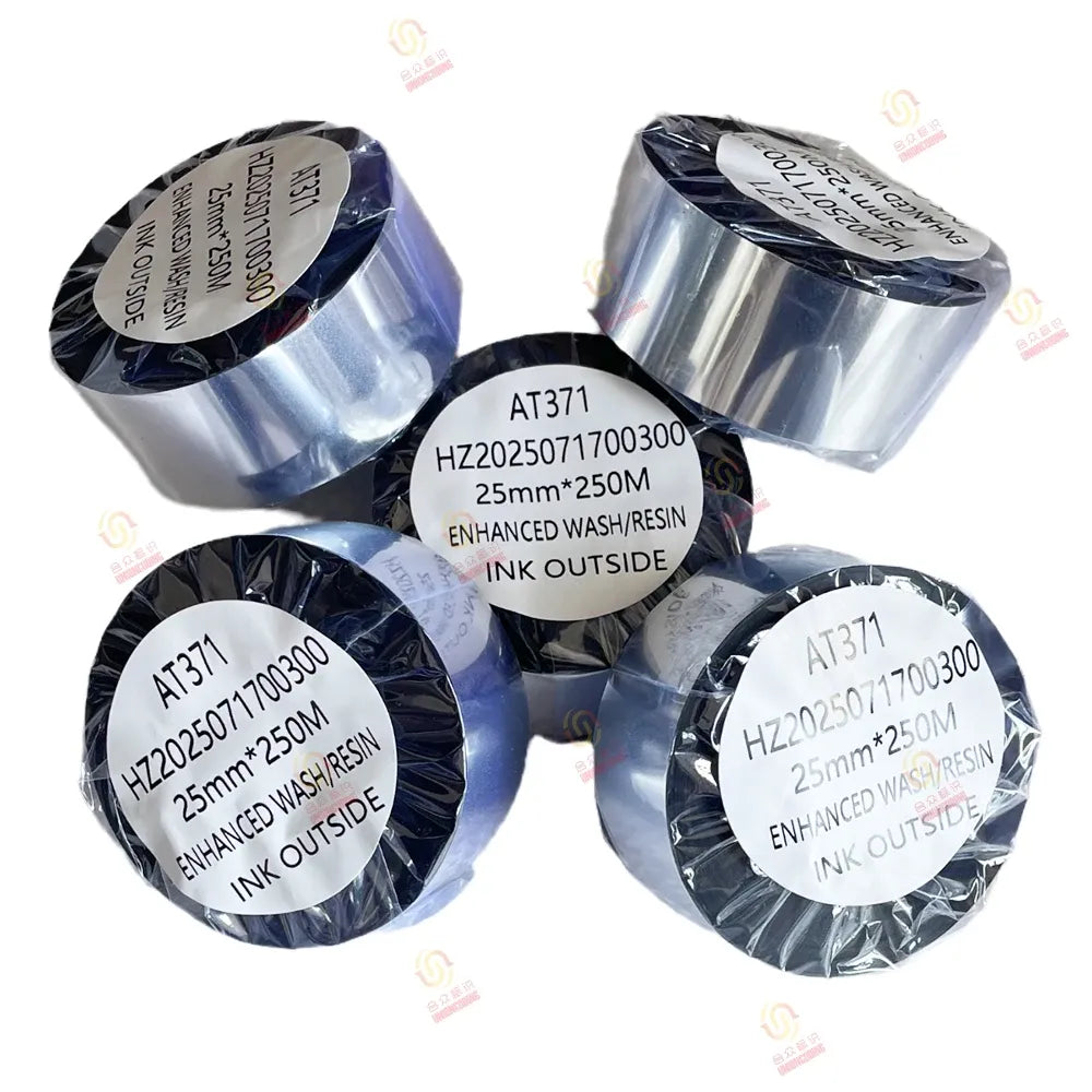Wax-resin ink ribbon rolls in dark and shiny blue wrapping, with barcode label