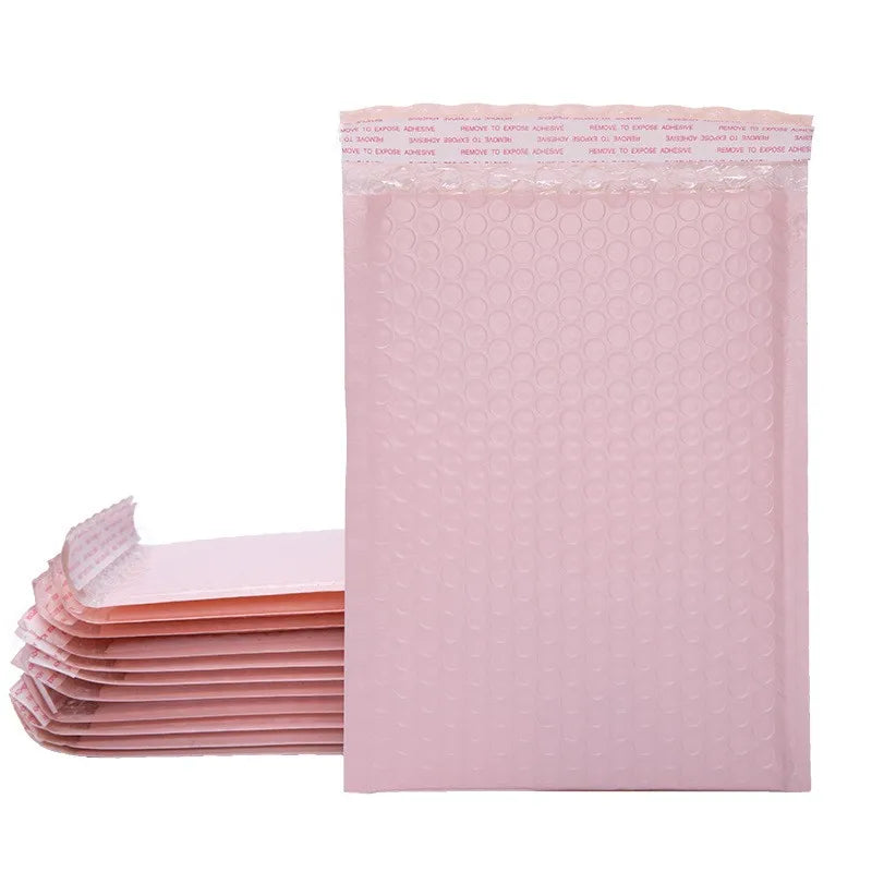 Pink bubble mailer bag with reclosable self-seal flap, textured protective padding