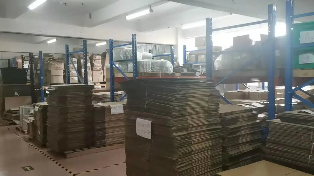Warehouse workshop with stacks of materials and tall shelving racks