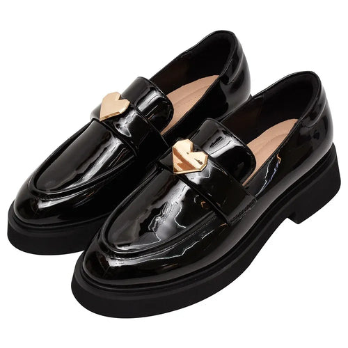Black patent leather luxury loafers with gold heart embellishment, chunky lug sole, and classic slip-on style.