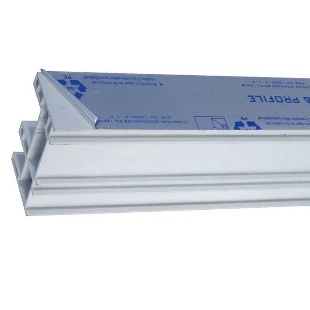 White protective tape adhered to window frame profile, angled view