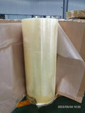 Clear BOPP tape jumbo roll tightly wrapped in protective packaging film