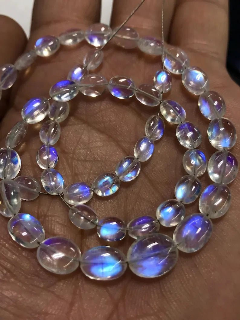Rainbow moonstone blue fire oval briolette bead strands on hand