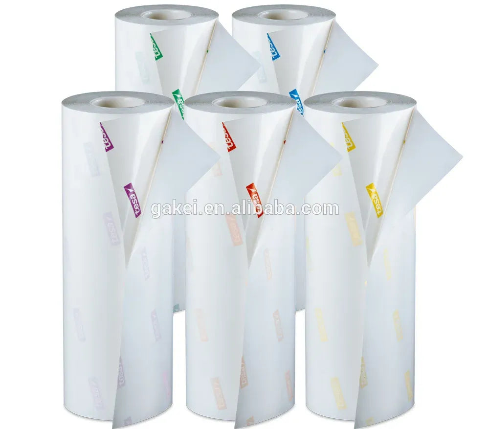 Set of white plate mounting masking tape rolls with colored tesa logo labels