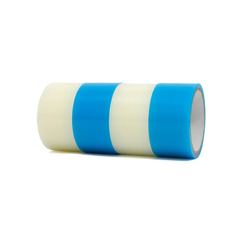 Stacked blue and white self-adhesive repair tape rolls, side view