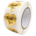 Heart thank you label stickers on a roll, metallic gold hearts with “Thank You” text