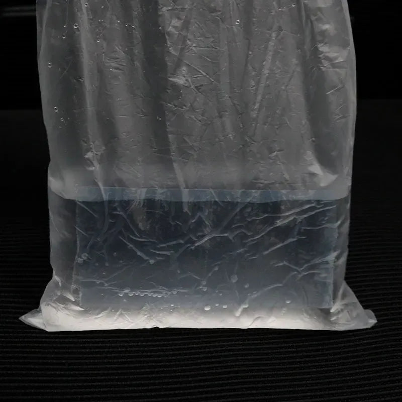Clear plastic sheet inside a protective bag, creased and wrinkled