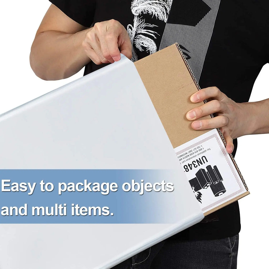 White poly mailer with built-in handle being filled; shipping box held nearby