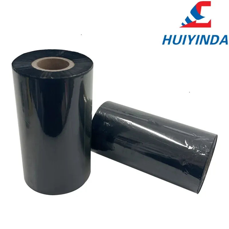 Black thermal transfer ink ribbon rolls, one upright and one lying flat