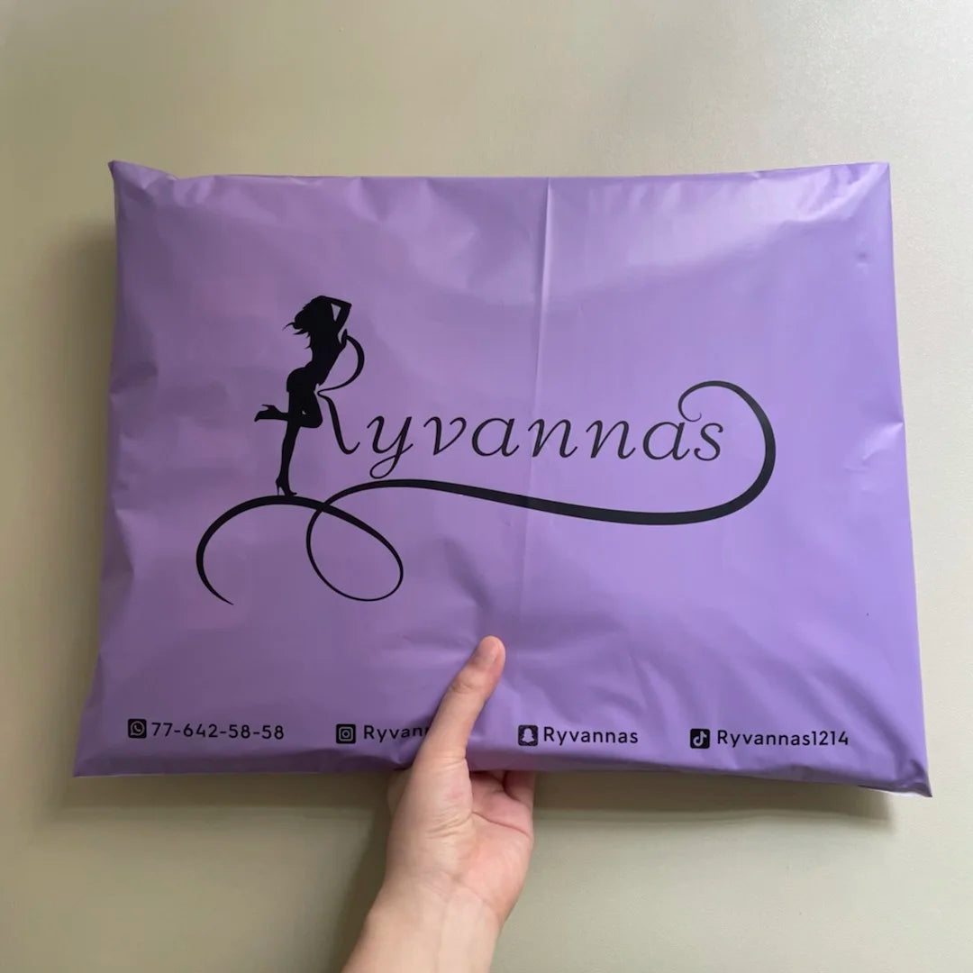 Purple poly mailer shipping bag with 'Ryvannas' logo and script design