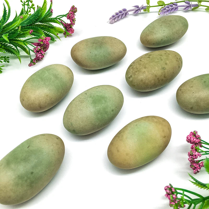 Green and yellow oval crystal pebbles for landscape decor, flat smooth stones