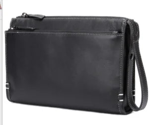 Black genuine leather designer handbag, slim shoulder tote with contrast stitching and dual zipper compartments.