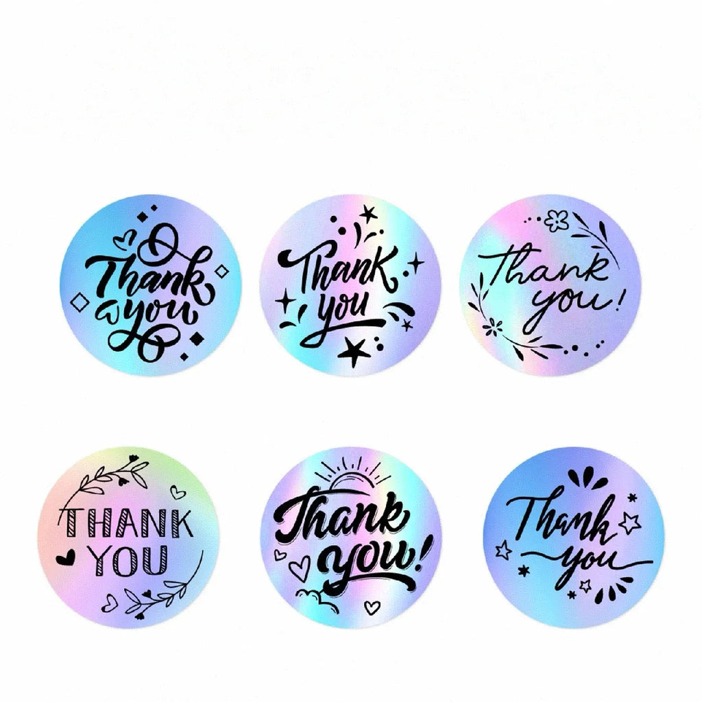 Set of round holographic thank-you sticker labels with decorative floral designs