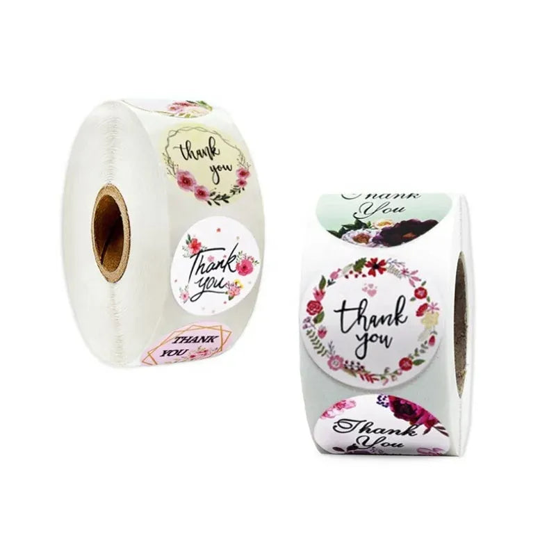 Thank you flower stickers roll with round floral labels and a smaller thank you label