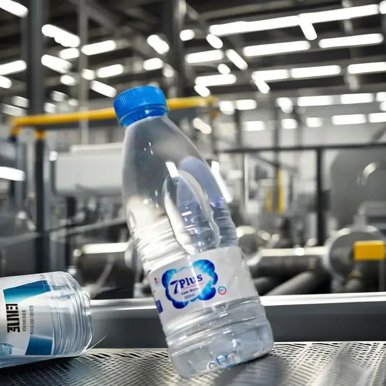 Plastic beverage bottle with blue cap and glossy printed label sticker