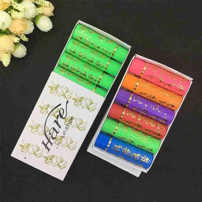 6-piece magic color-changing lipstick set with butterfly-print tubes in vibrant shades. Long-lasting lip makeup.
