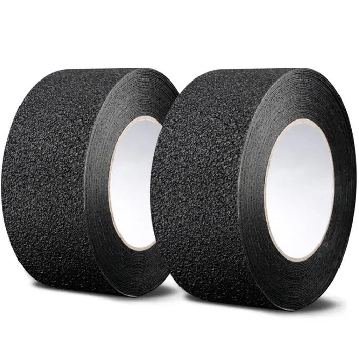 Black anti-slip tape roll with textured, granular surface for traction