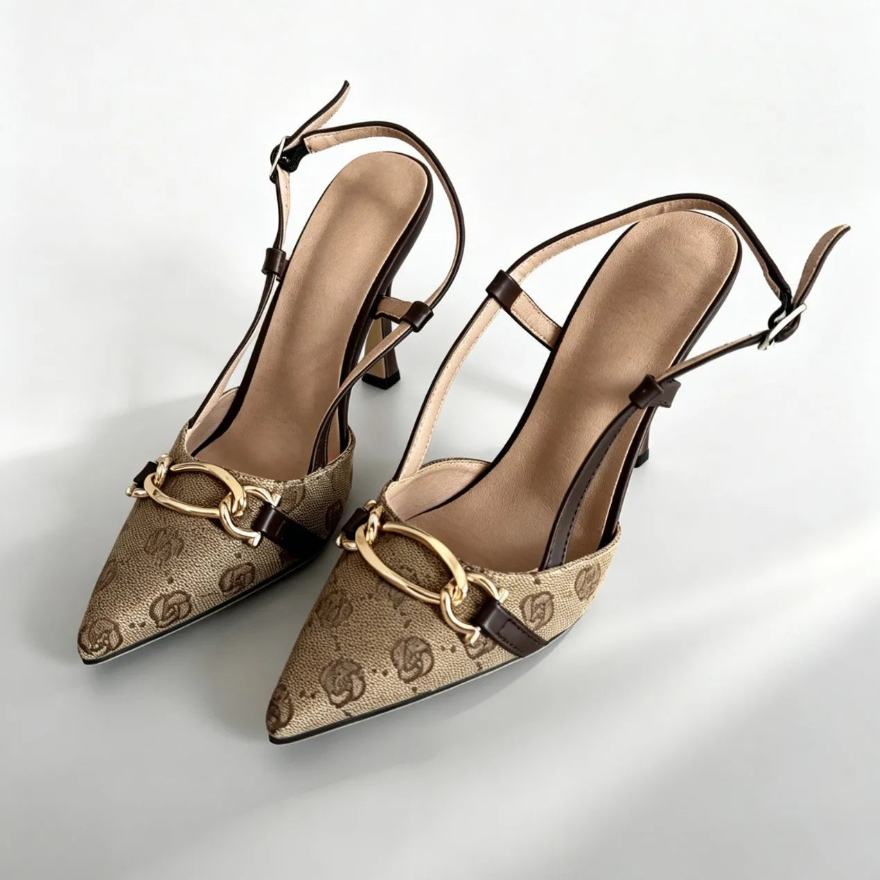 This Fashionable Sandal Features a  Rhinestone Bow Design. It Has a Unique, Slender Heel Style and Is Versatile