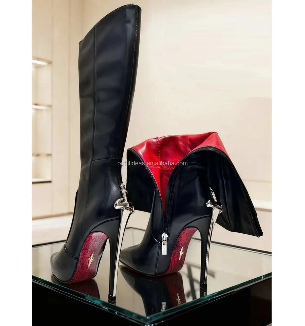 Luxury black leather knee-high boots with silver dagger stiletto heels, red lining, and sole. Perfect for evening wear.