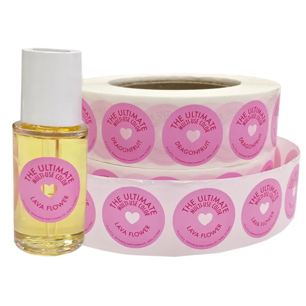Round pink adhesive label sticker roll with circular “THE ULTIMATE MULTI-USE” text