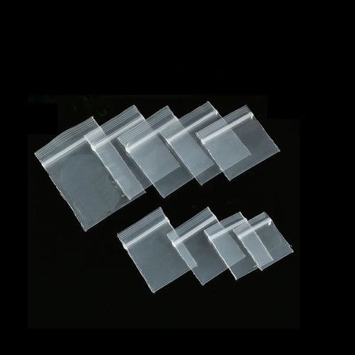 Clear mini reclosable poly ziplock bags, stacked in multiple small pieces.