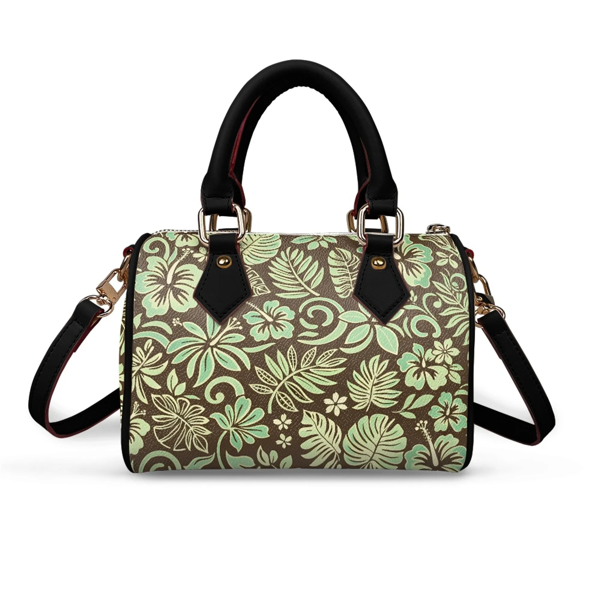 Pillow-shaped handbag with brown and mint green tropical floral print, black handles, and gold hardware. Trunk style.