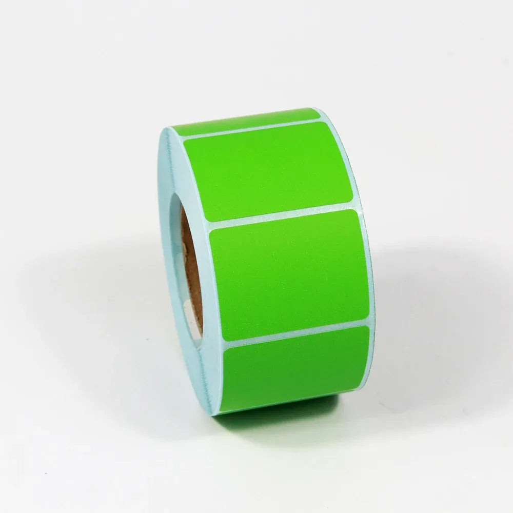 Green color label sticker roll with rectangular blank labels