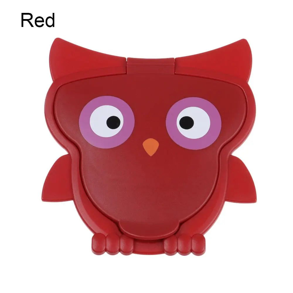 Red owl-shaped baby care wipe case for travel storage.