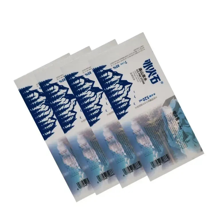 Blue beverage label sticker sheets with barcodes and glossy printed artwork