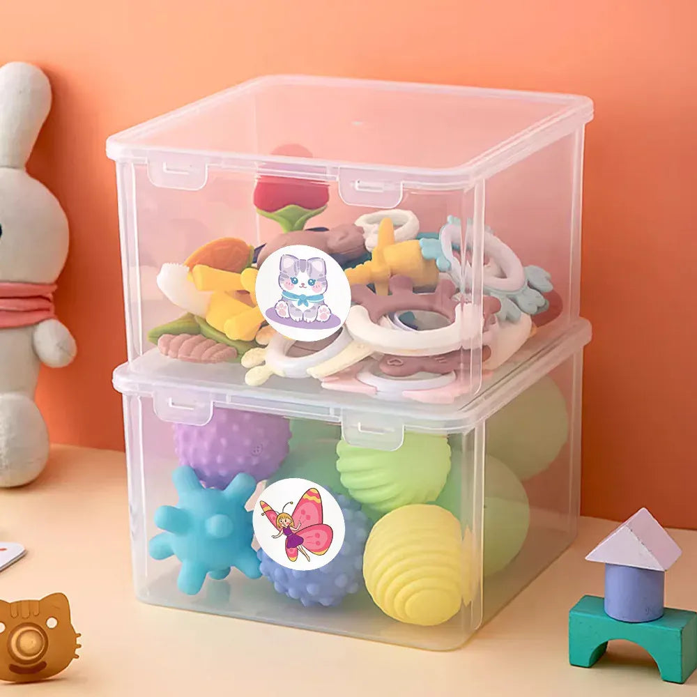 Assorted cute animal sticker cutouts in a clear plastic storage box