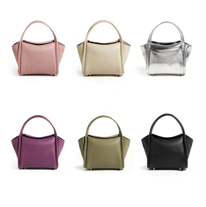 Designer leather yuanbao handbags in various colors featuring a structured top handle and minimalist casual design.