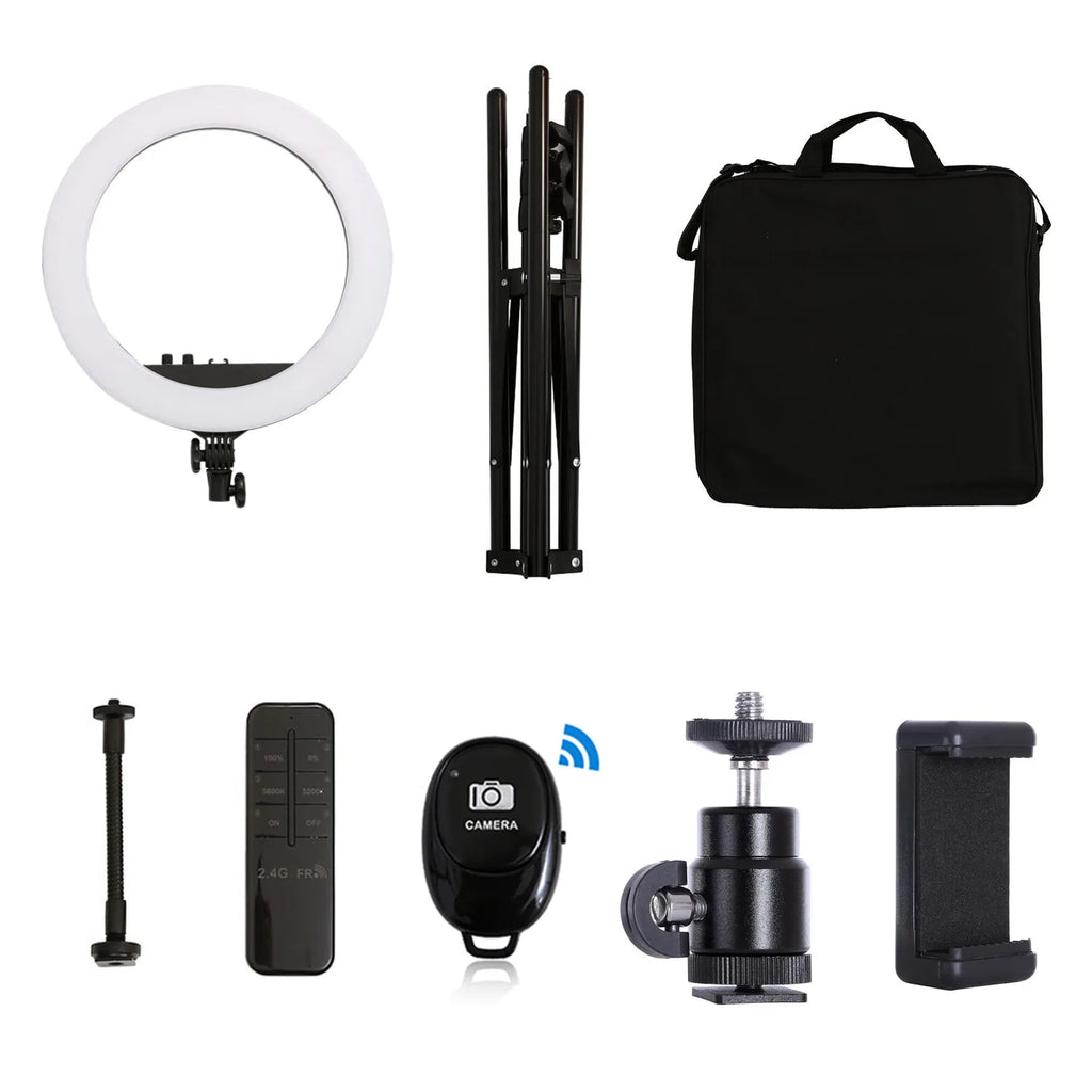 Ring light kit with circular light, tripod stand, black carry bag, remote, phone mount, and accessories for photography.