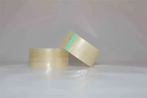 Transparent packing tape rolls with green dot stripe, pressure-sensitive acrylic adhesive