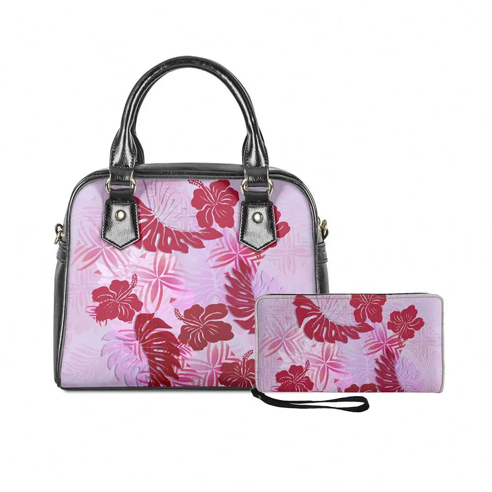 Polynesian tribal handbag and wallet set with pink Hawaiian monstera leaf and hibiscus print.