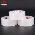 White carton sealing tape rolls with printed core labels, single-sided adhesive tape